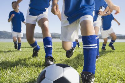 children playing soccer